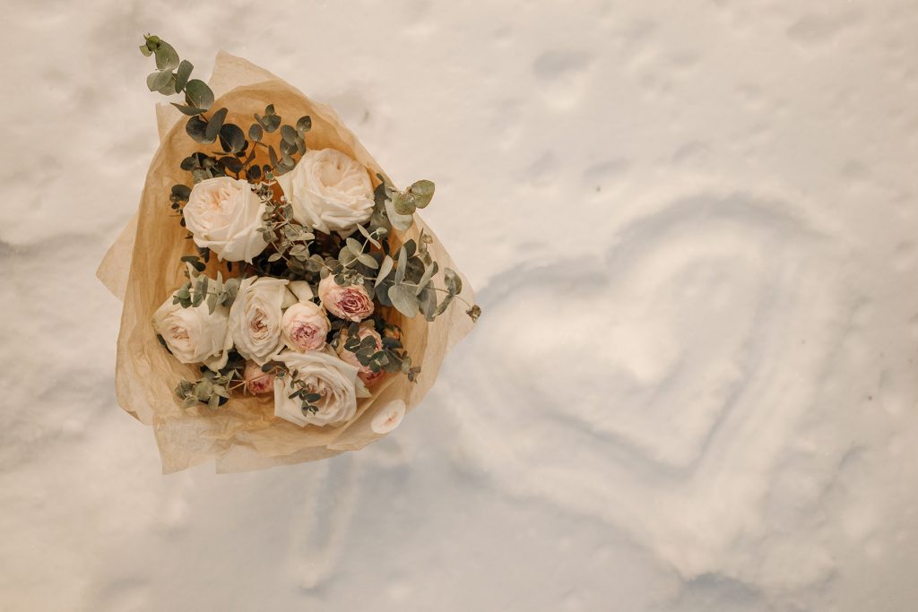 wedding flowers on snow for a winter wedding